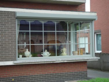 Raam in PVC met houtstructuur - 1 zijde folie